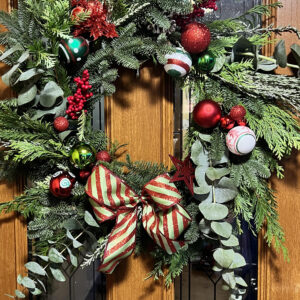 Red and green classic door wreath